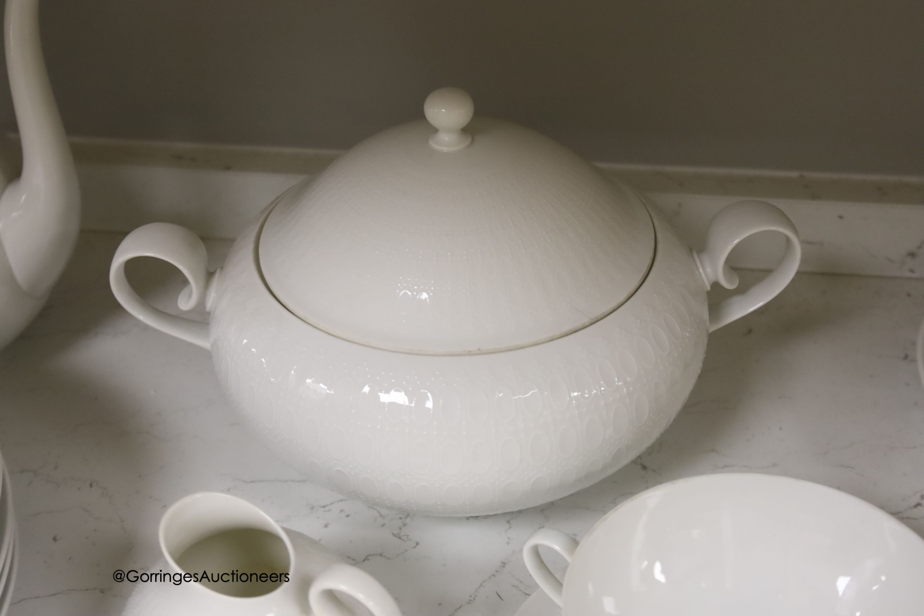 A Rosenthal studio-line relief moulded porcelain dinner and coffee service (52)